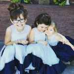 Customer picture for Deep V Back Ivory Lace Flower Girl Dress with navy blue bow
