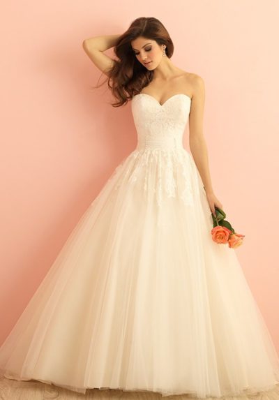  exquisite ballgown is topped with lace appliques