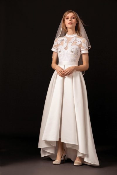 Retro-inspired wedding dress with raised center hemline by Temperley Bridal