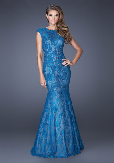 Trumpet style gown with a light lining to accentuate the design of the lace overlay
